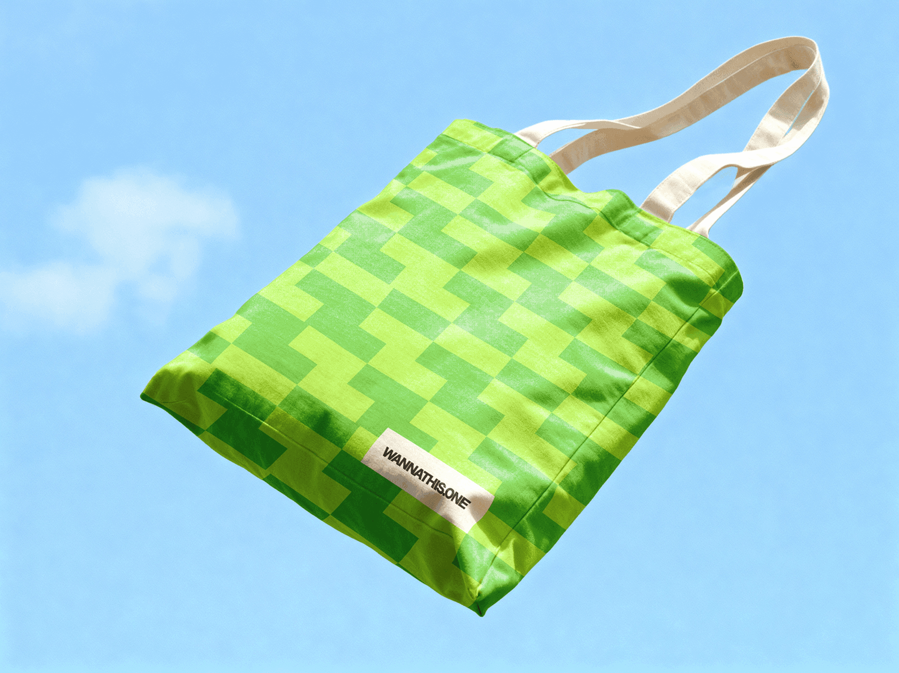 Tote bag mockup floating outdoors against an open sky