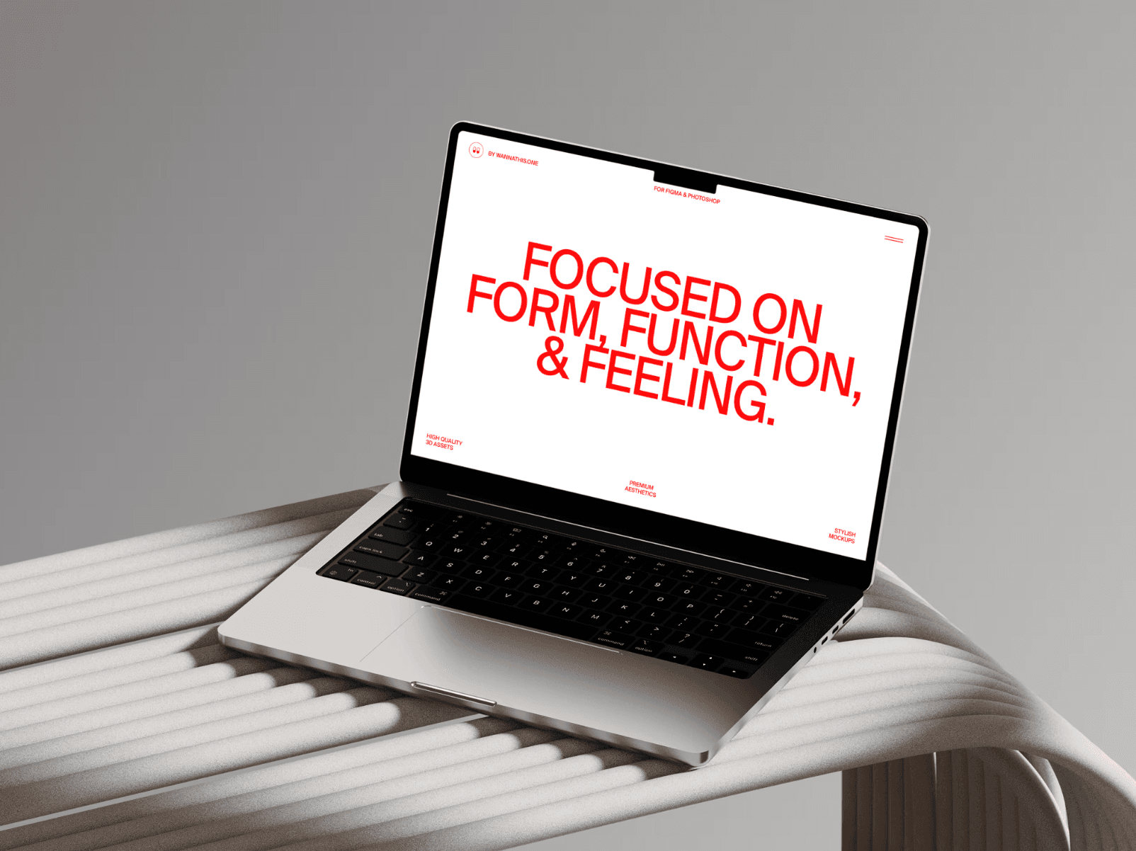 MacBook Pro mockup on sculptural surface — elegant scene with red typography and minimalist mood.