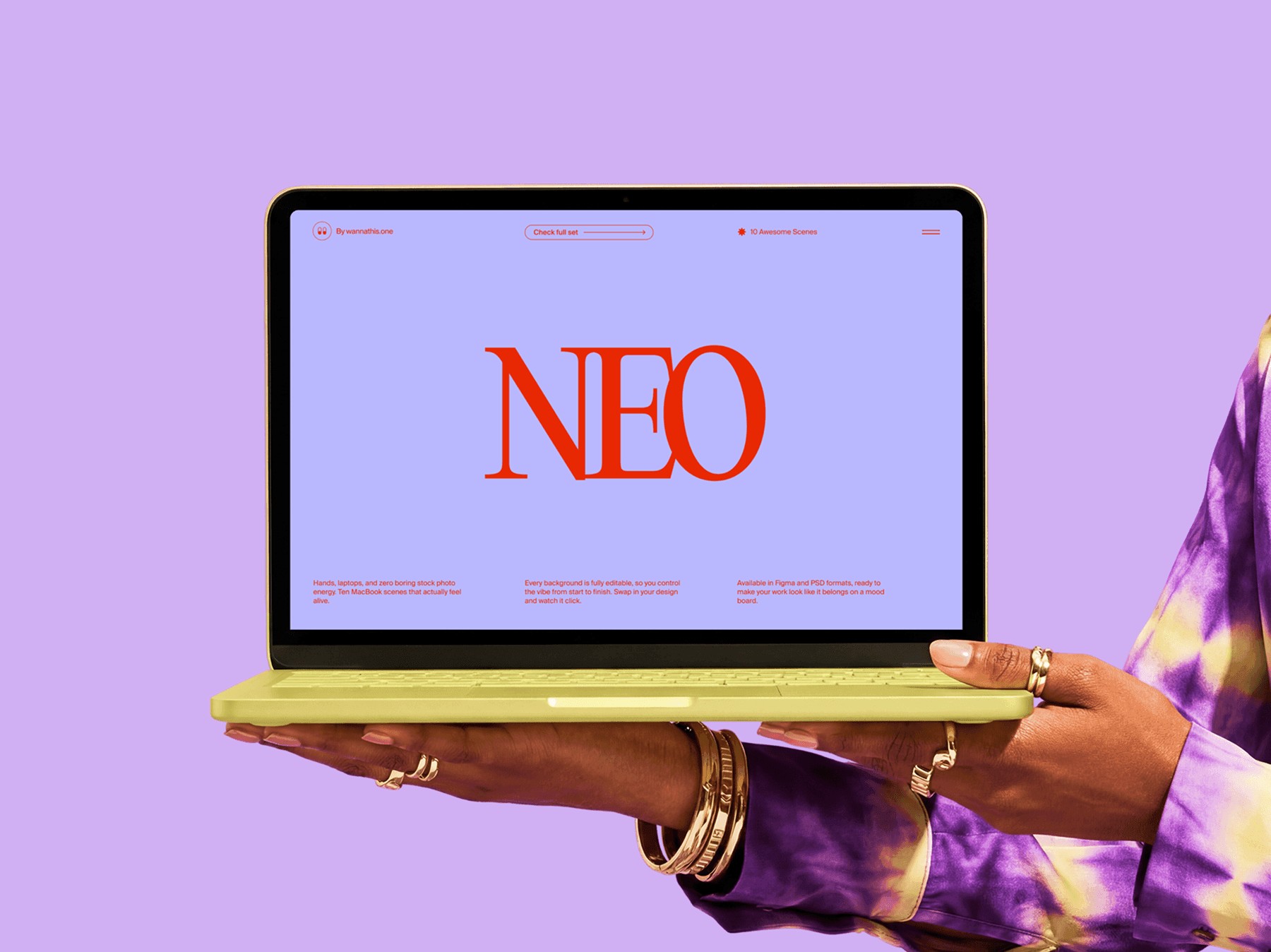 MacBook laptop held from the side with one hand in a clean studio setup