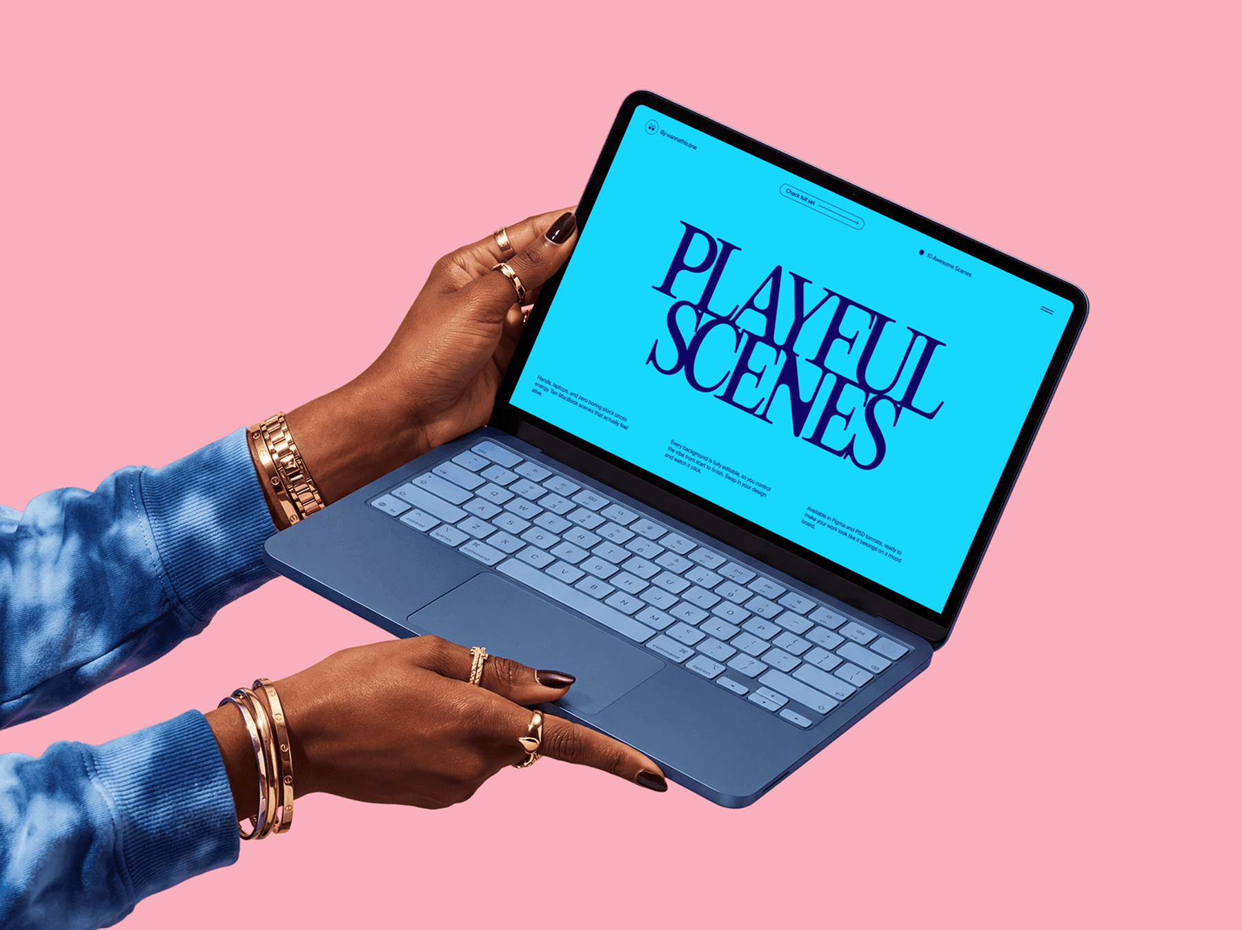 Hands holding a MacBook at an angle for presentation