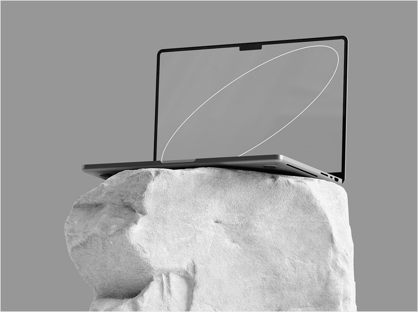 MacBook Pro mockup displayed on large natural rock in white setting