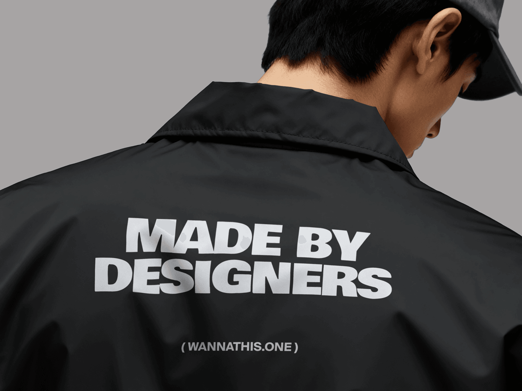 Jacket apparel mockup shown from the back on a standing model