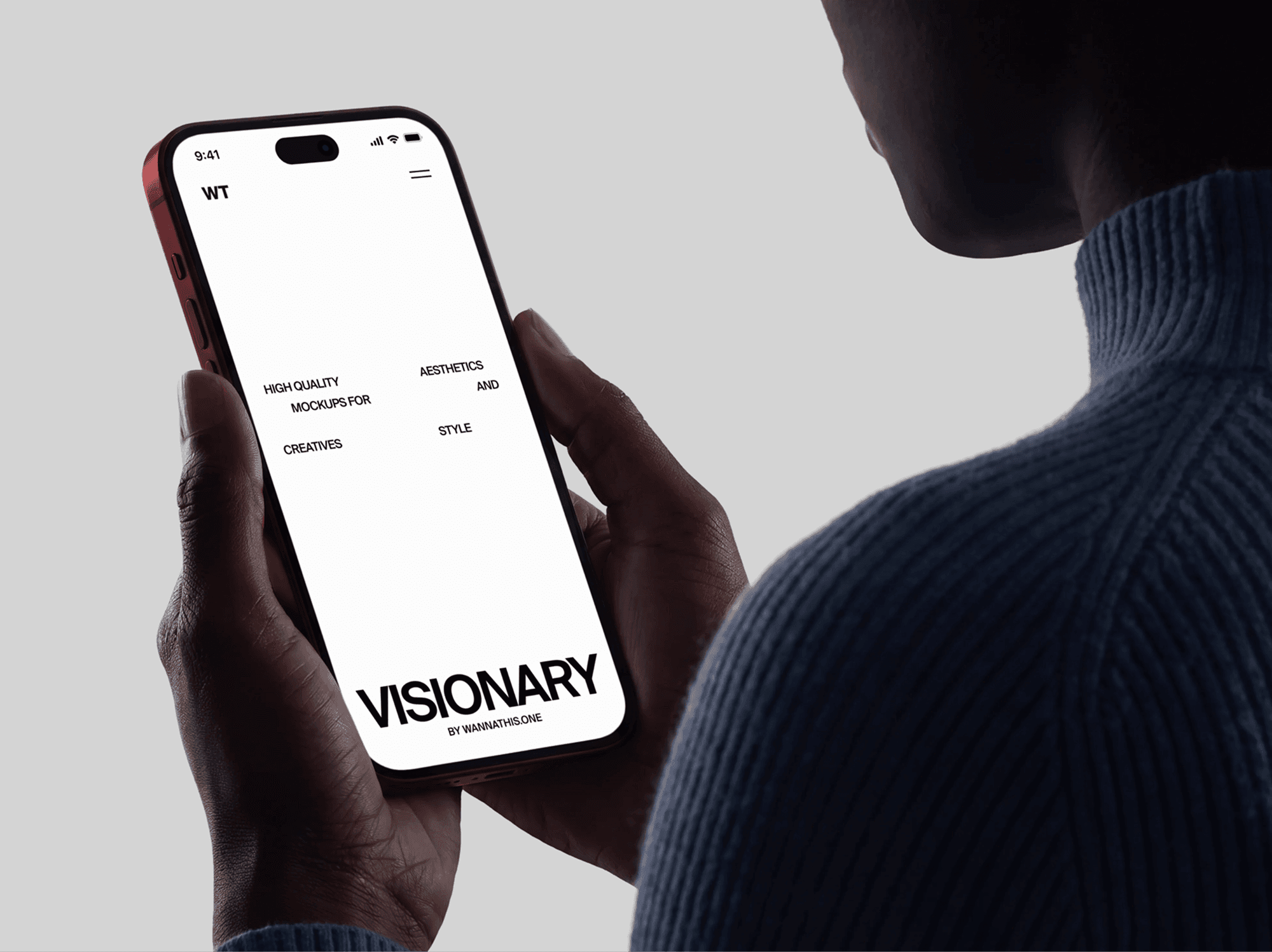 iPhone 18 Pro mockup held in two hands by a person in a ribbed knit sweater
