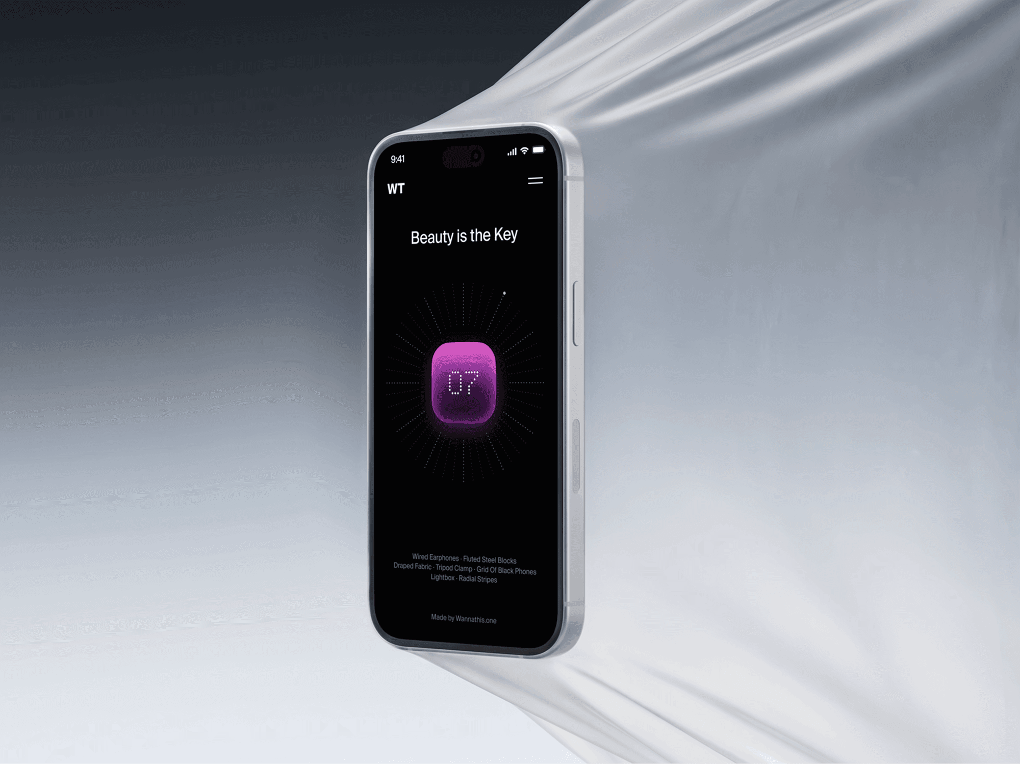 iPhone 18 Pro mockup angled in front of a sheet of softly draped silver fabric