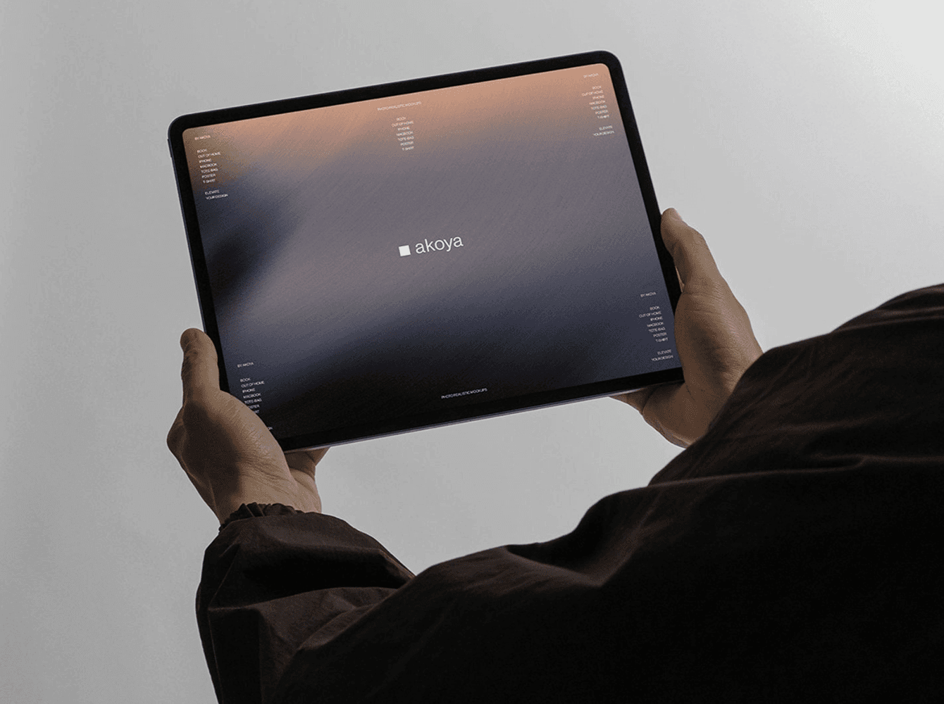 Neutral iPad mockup held in hands with abstract blurred gradient screen