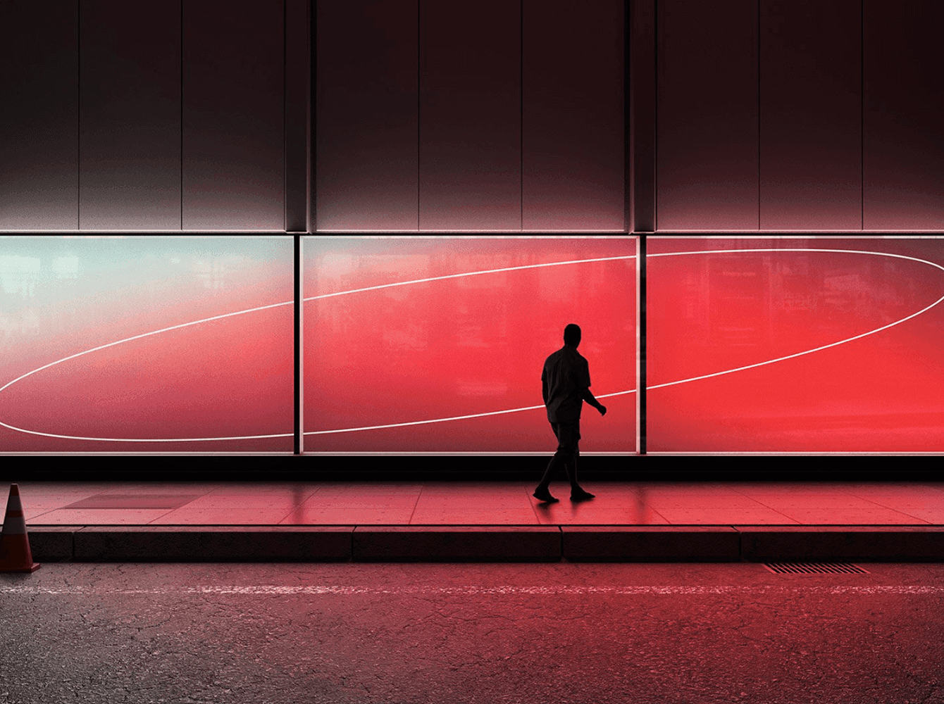 Wide city billboard mockup glowing with red and white gradient at night with silhouette of a person walking