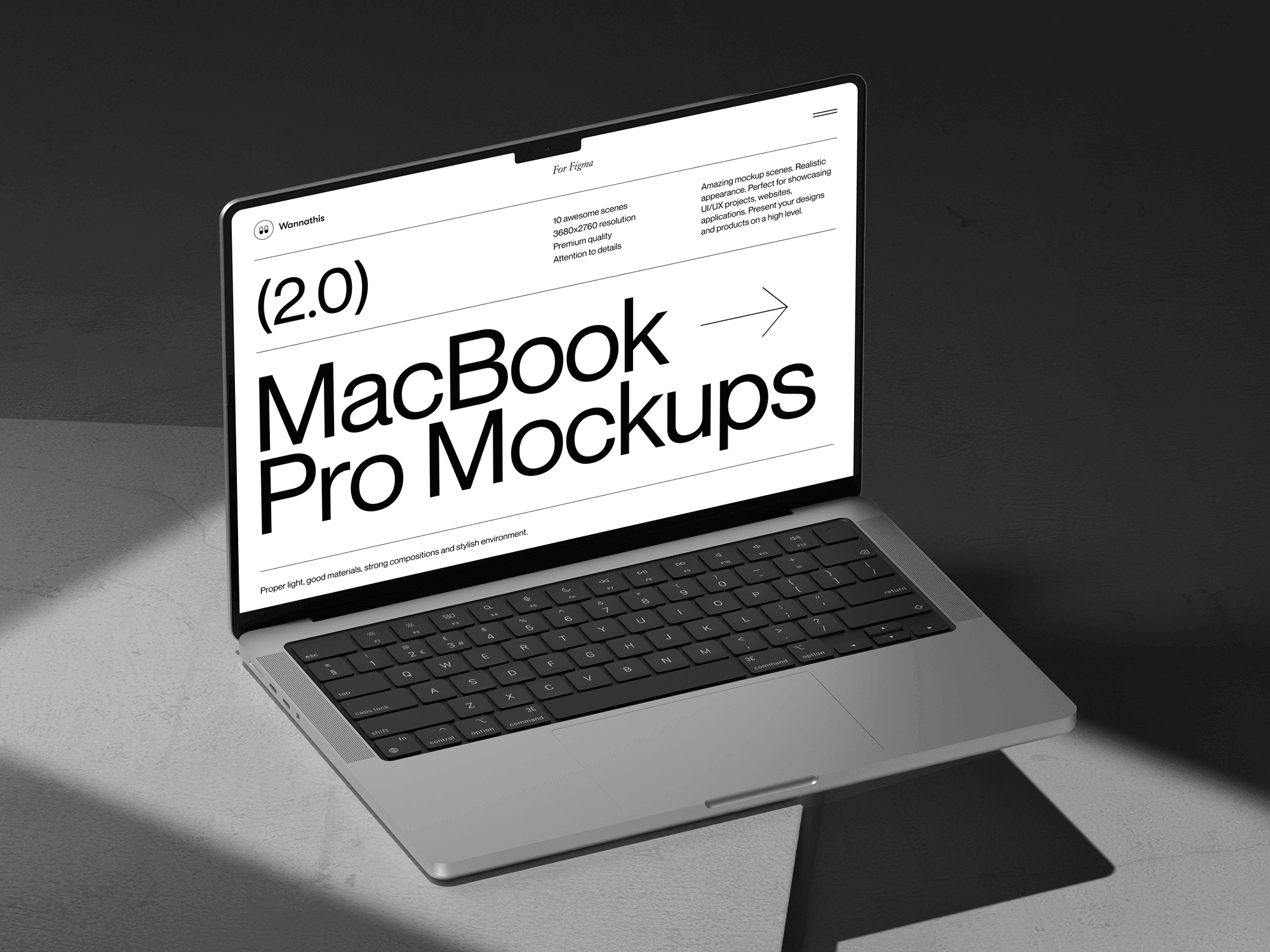 A MacBook Pro mockup on grey surface.