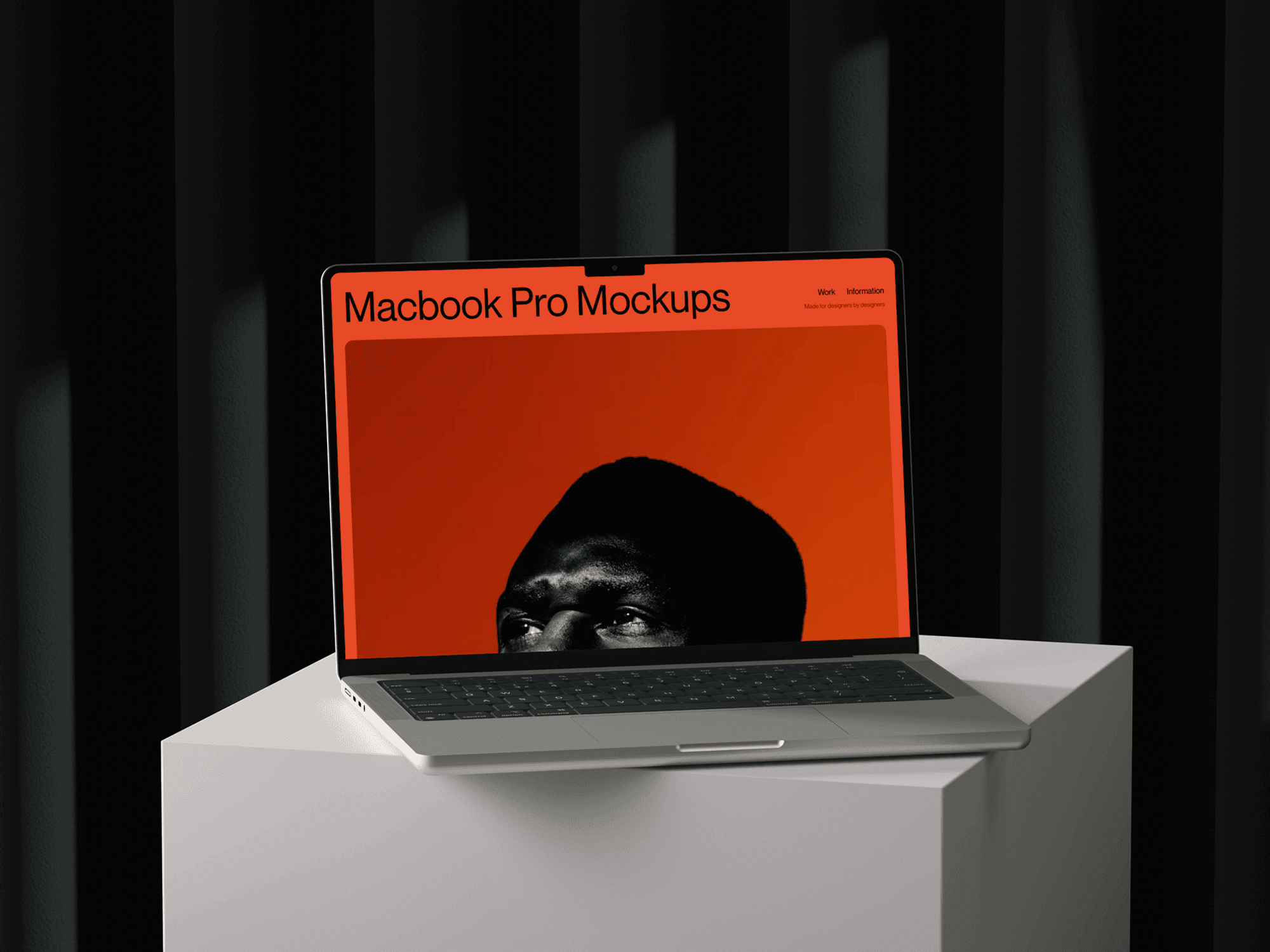 MacBook Pro mockup placed on a clean pedestal with a dark studio backdrop