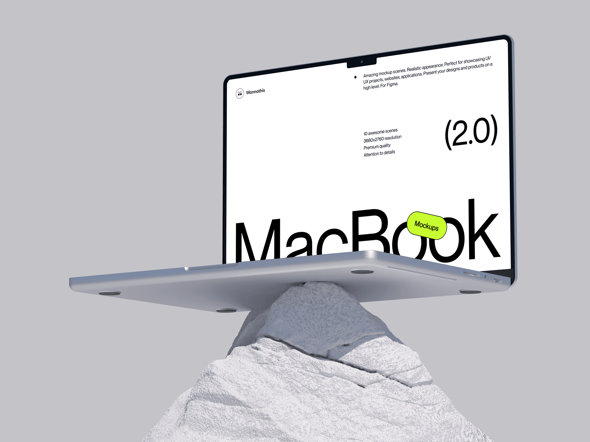 A MacBook Pro mockup balanced on a rock in a minimal setting.