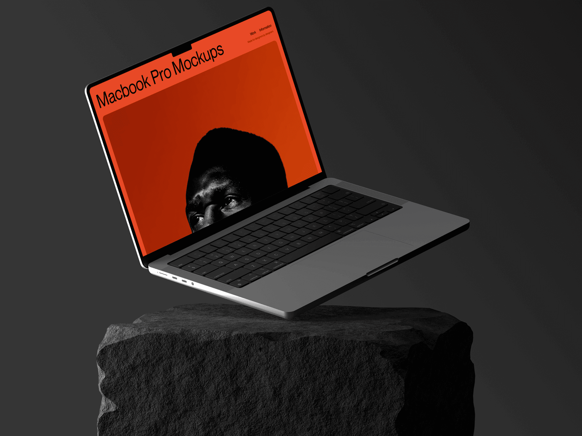 Floating MacBook Pro mockup with a bold artistic design