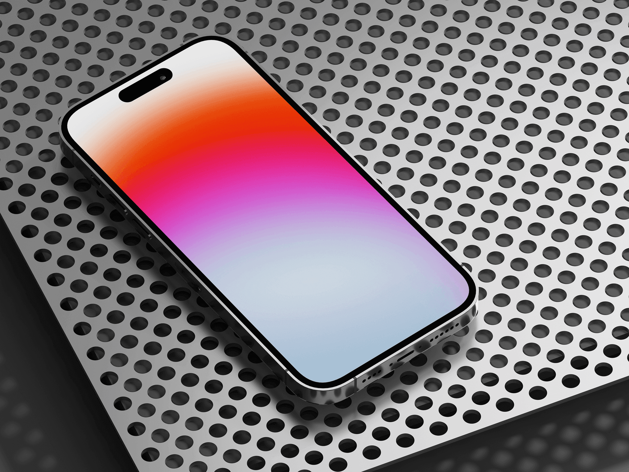 iPhone 14 Pro resting on a perforated metallic surface.