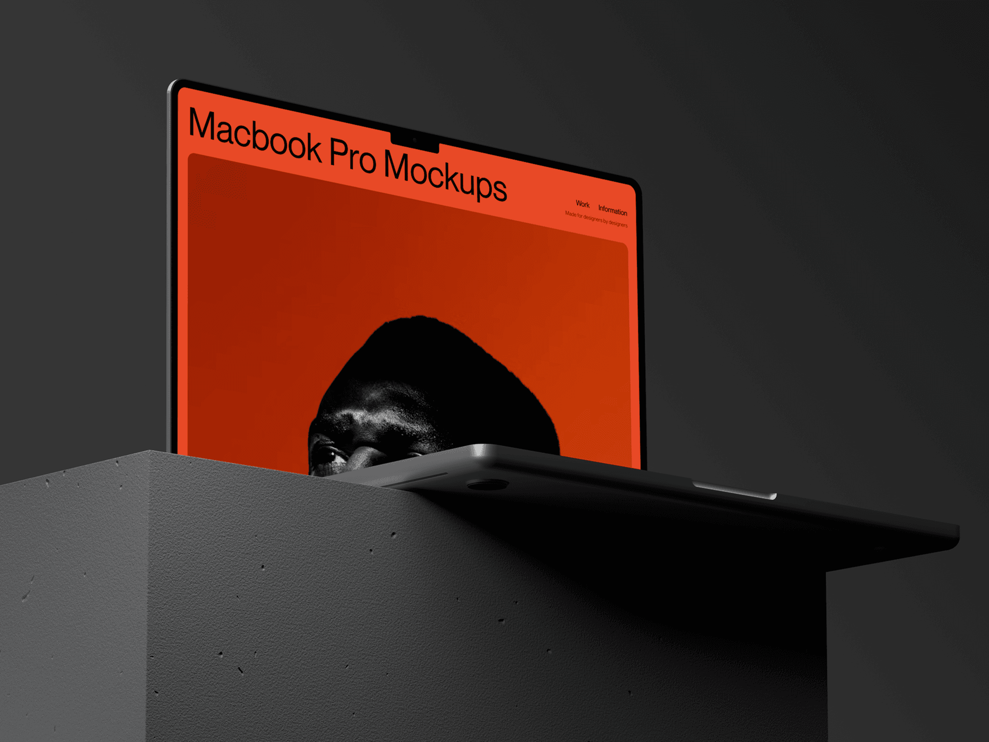 MacBook Pro mockup with dramatic lighting on a dark pedestal