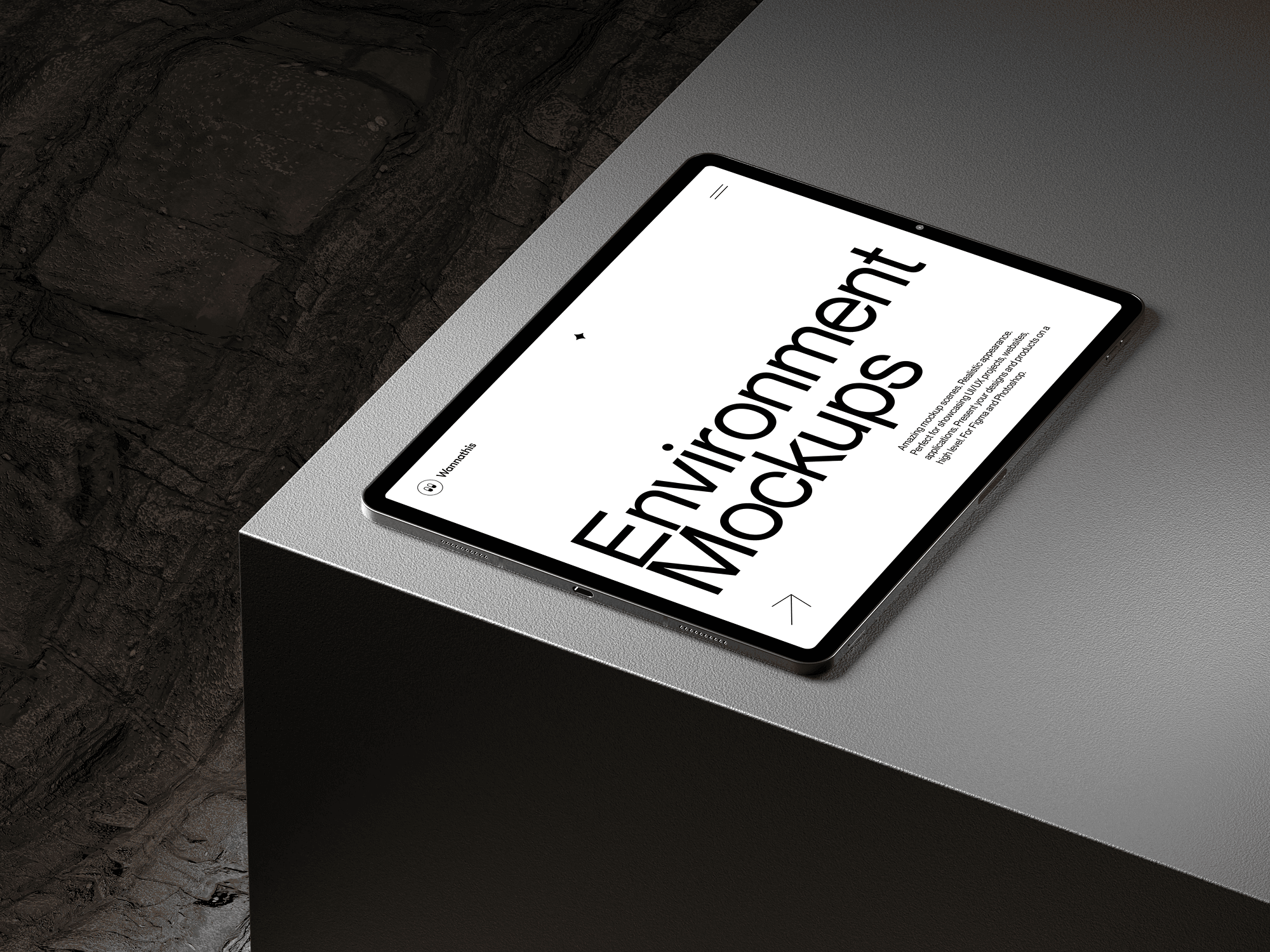 iPad Pro mockup resting on a metallic surface with a rugged stone backdrop.