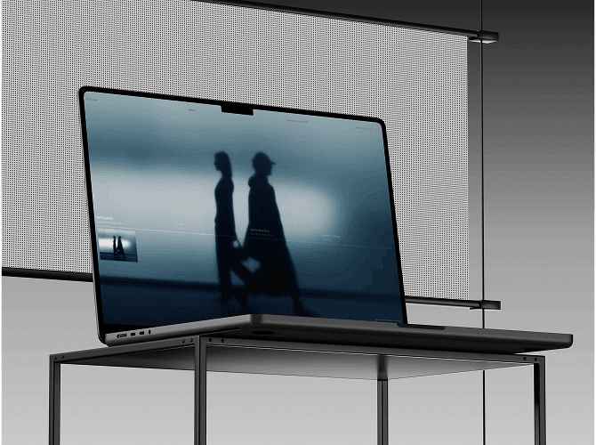 Pulvinar Framer portfolio template on a MacBook in a grey studio, a moody blue full-bleed photo hero, a quiet template for photographers and art directors