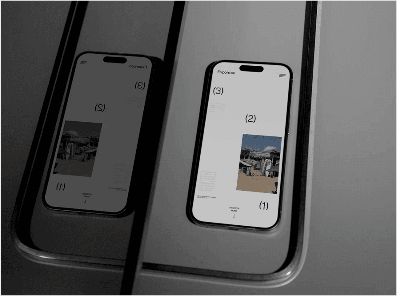 iPhone 15 Pro mockup with website design displayed on screen placed on reflective glass surface showing mirror reflection