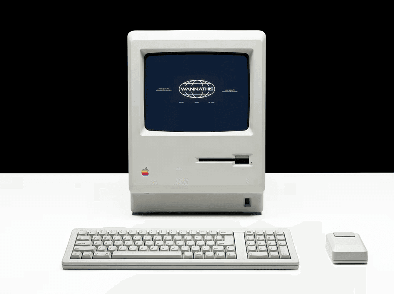 A vintage beige desktop computer mockup with a globe logo on a dark screen, keyboard and mouse on white, an example of a retro device mockup for branding