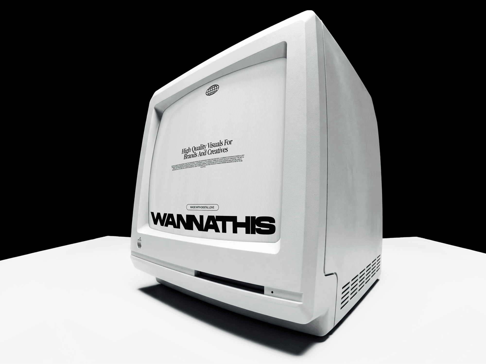 Rounded retro all in one computer seen from the side showing the curved rear shell