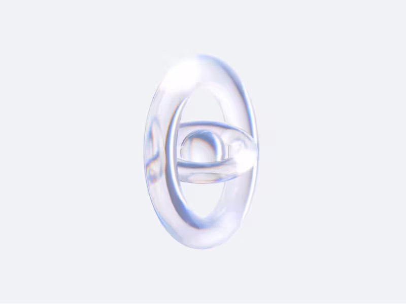 Abstract rotating glass ring with inner sphere in motion