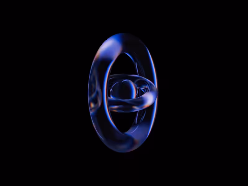 Glass abstract shape with orbiting ring and central sphere