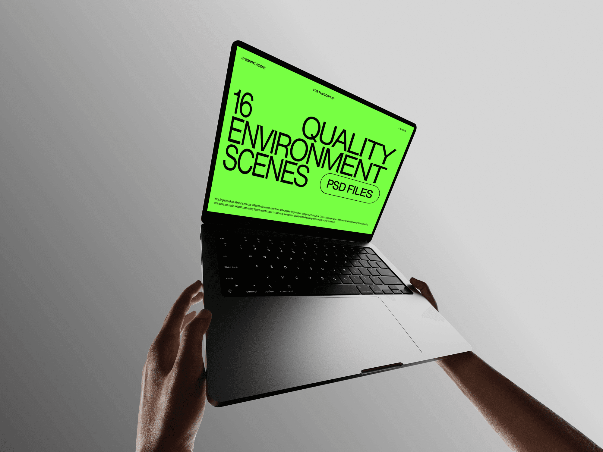 MacBook mockup held by hands