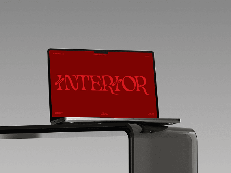 MacBook mockup staged on elevated sculptural metal stand