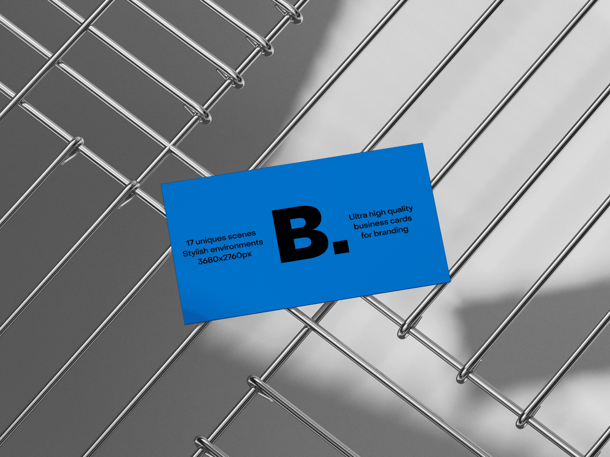 A stylish business card mockup placed on a metallic grid structure.