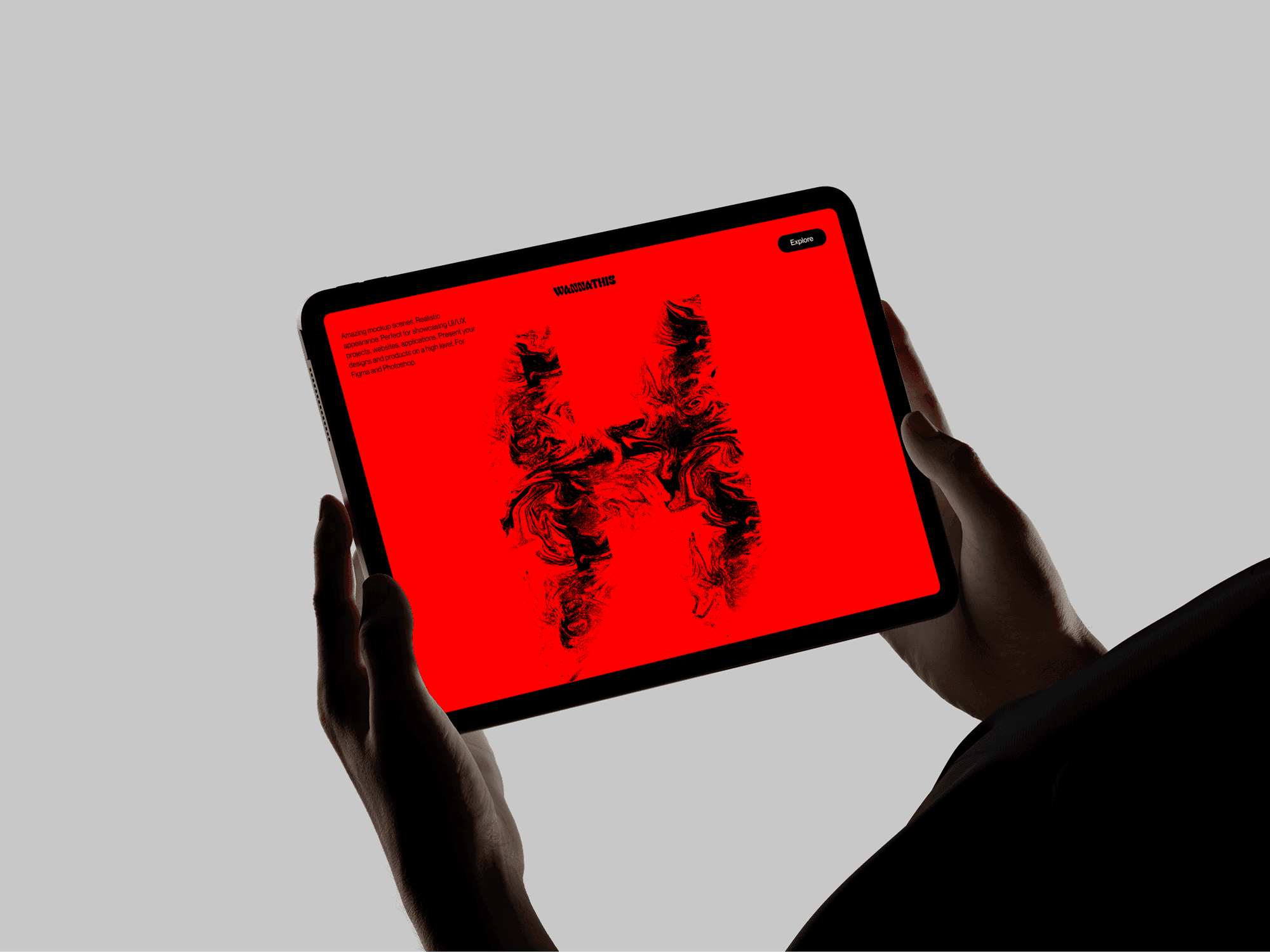iPad in landscape mode held with both hands on a light minimal background