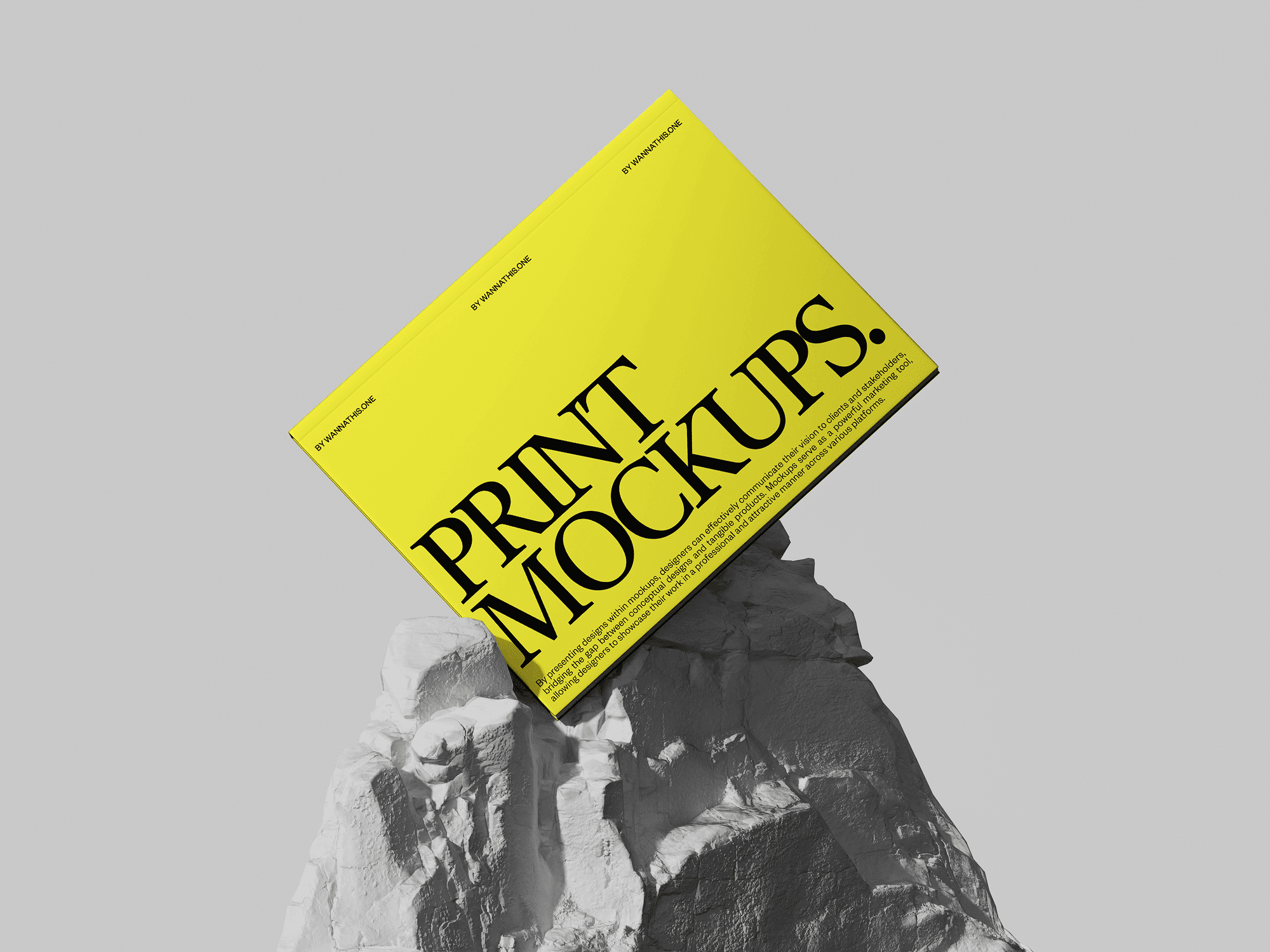 A yellow print mockup standing on a rocky surface