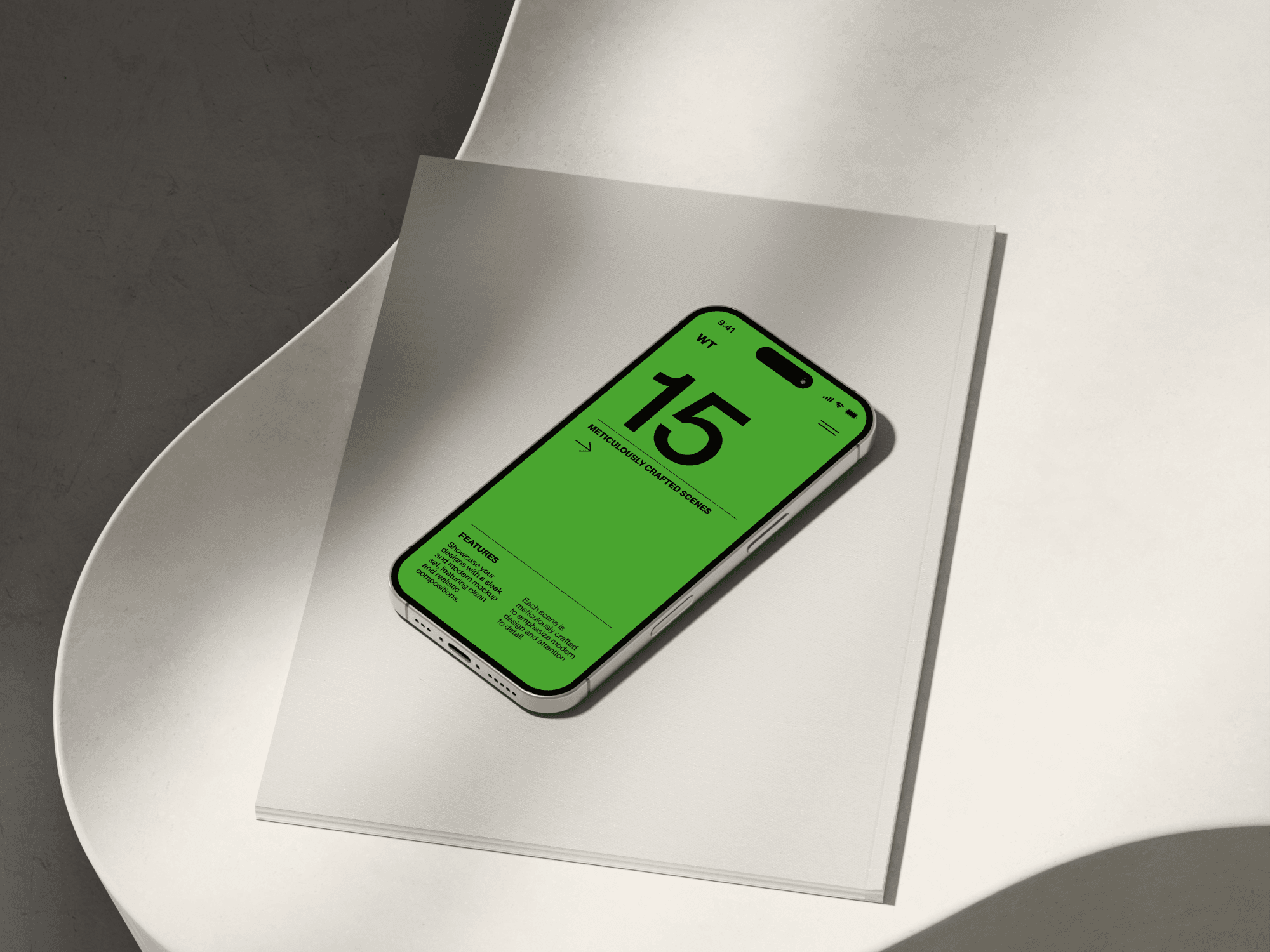iPhone 16 mockup resting on a metallic surface with curved white shapes.