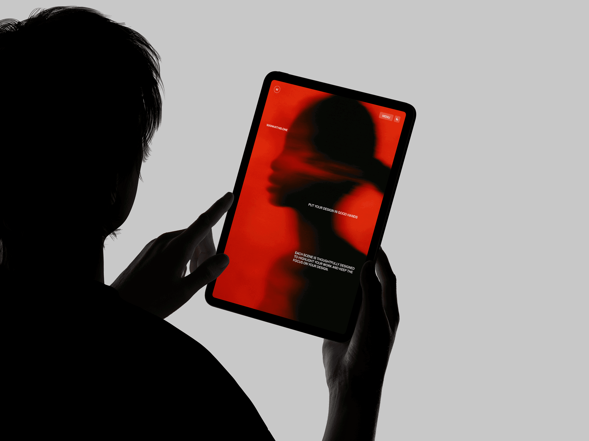 iPad mockup held in portrait mode by both hands against a clean light minimal studio background
