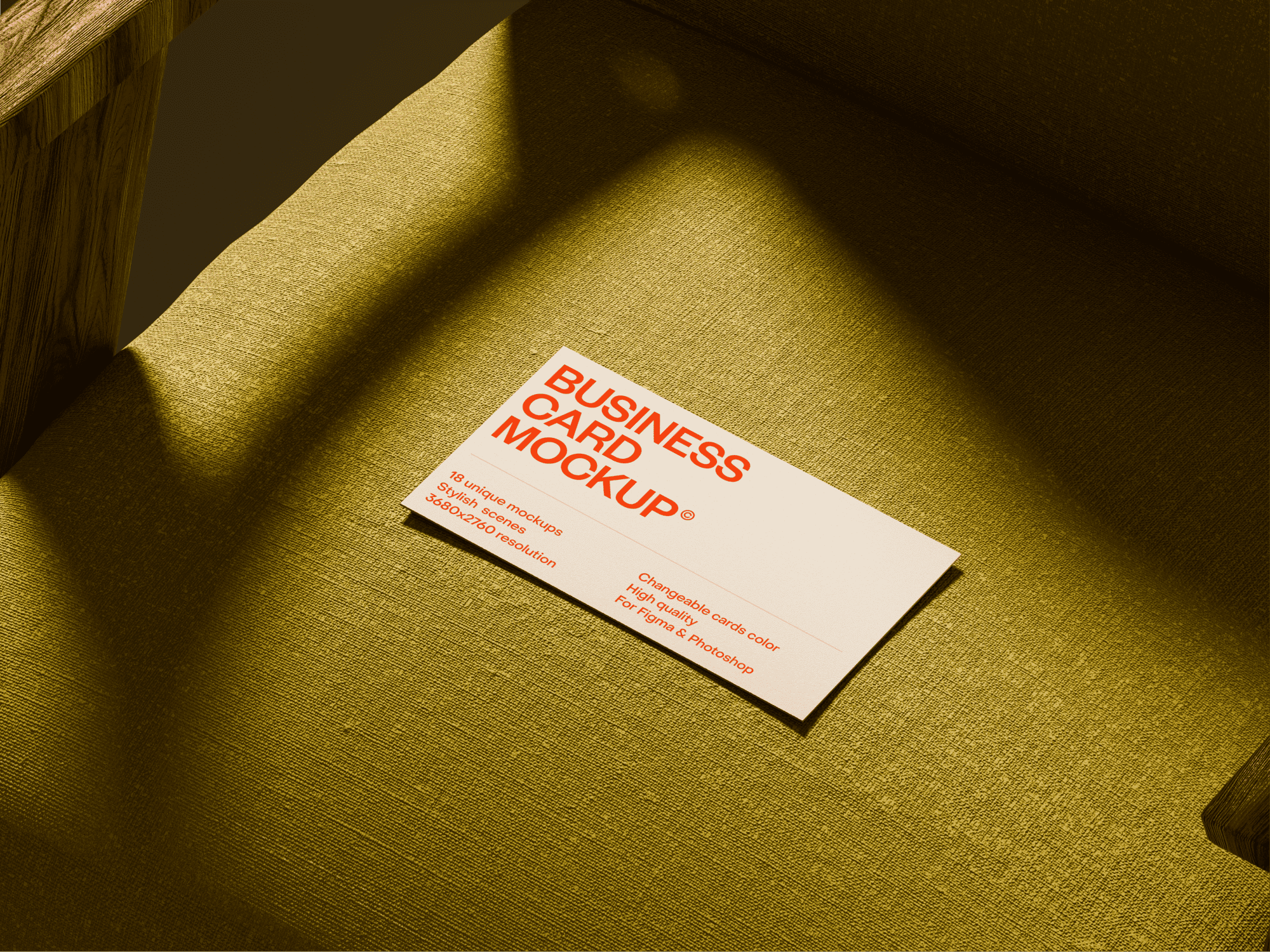 Business card mockup on olive fabric chair