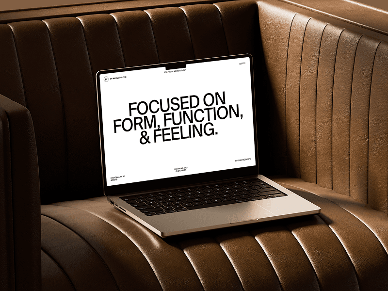 Laptop mockup placed on rich cognac leather sofa cushions