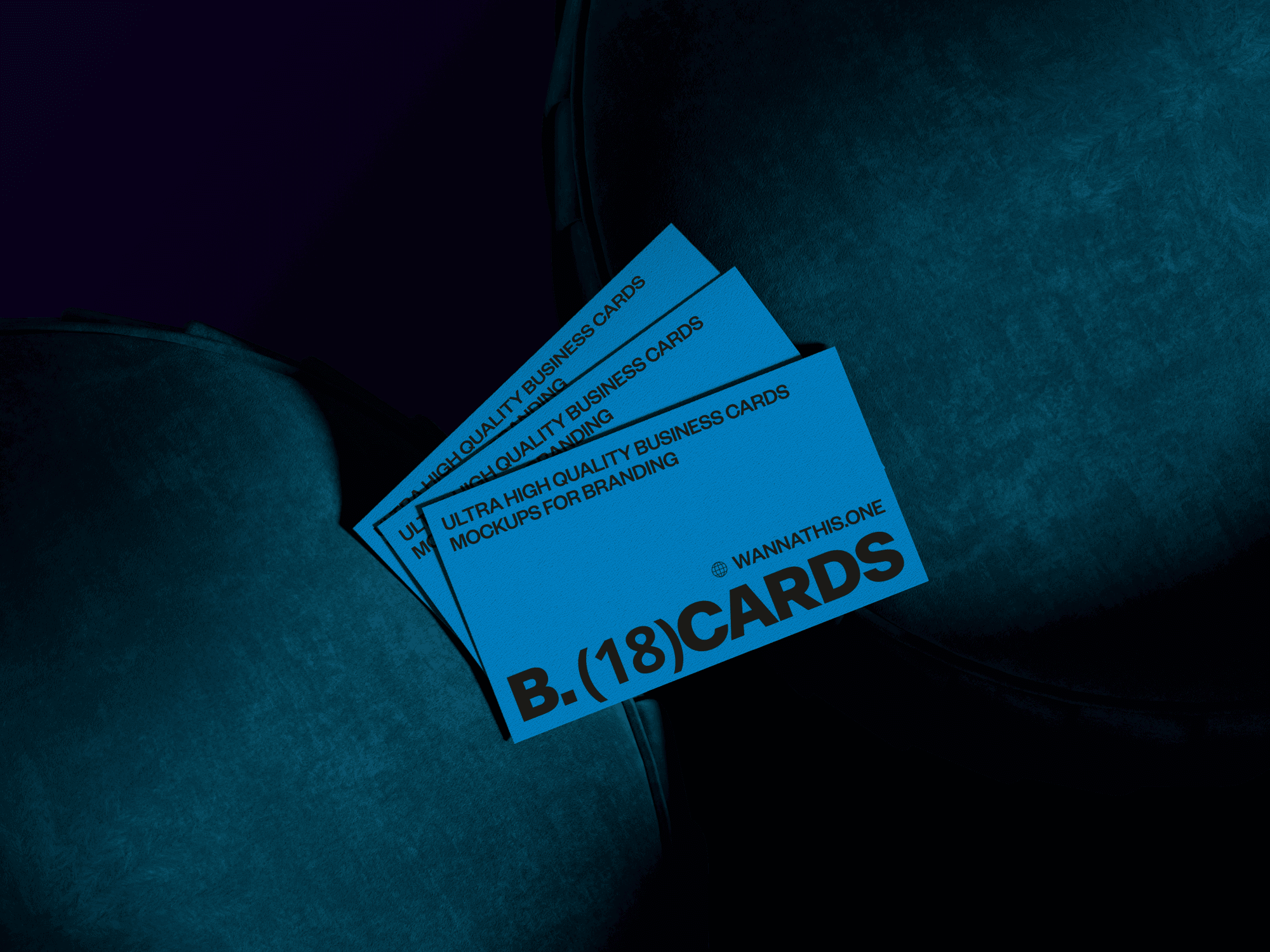 Set of blue business cards on dark blue cushions