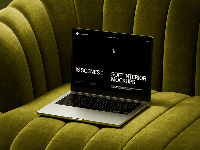 Laptop mockup staged on golden green tufted interior couch