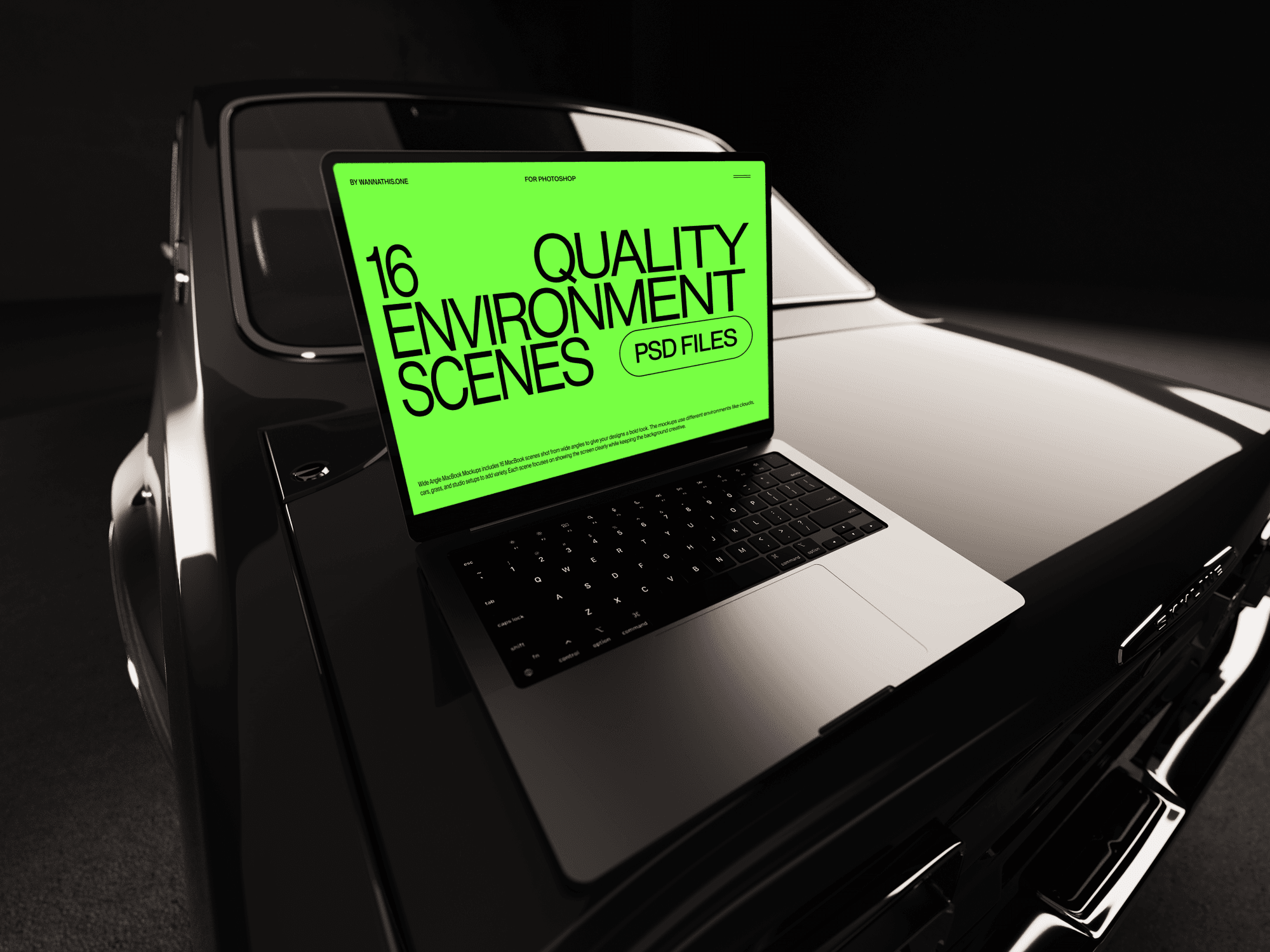 MacBook on a vintage black car with green environment scenes screen