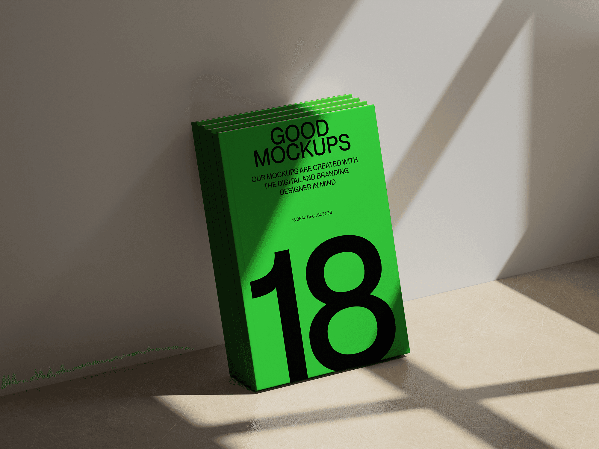 A stack of green books mockups standing upright against a wall, illuminated by soft sunlight