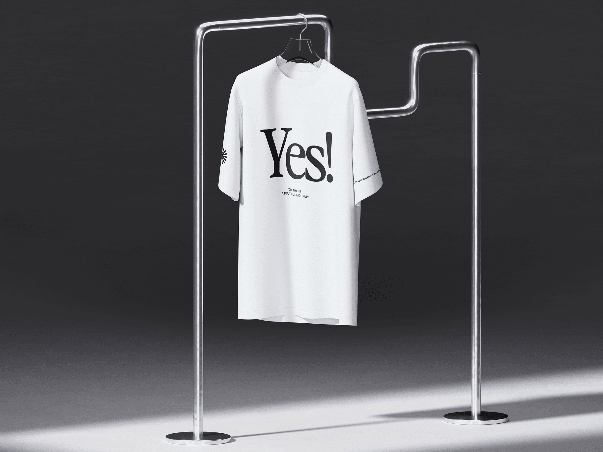 A white t-shirt mockup hanging on a sleek metal clothing rack.