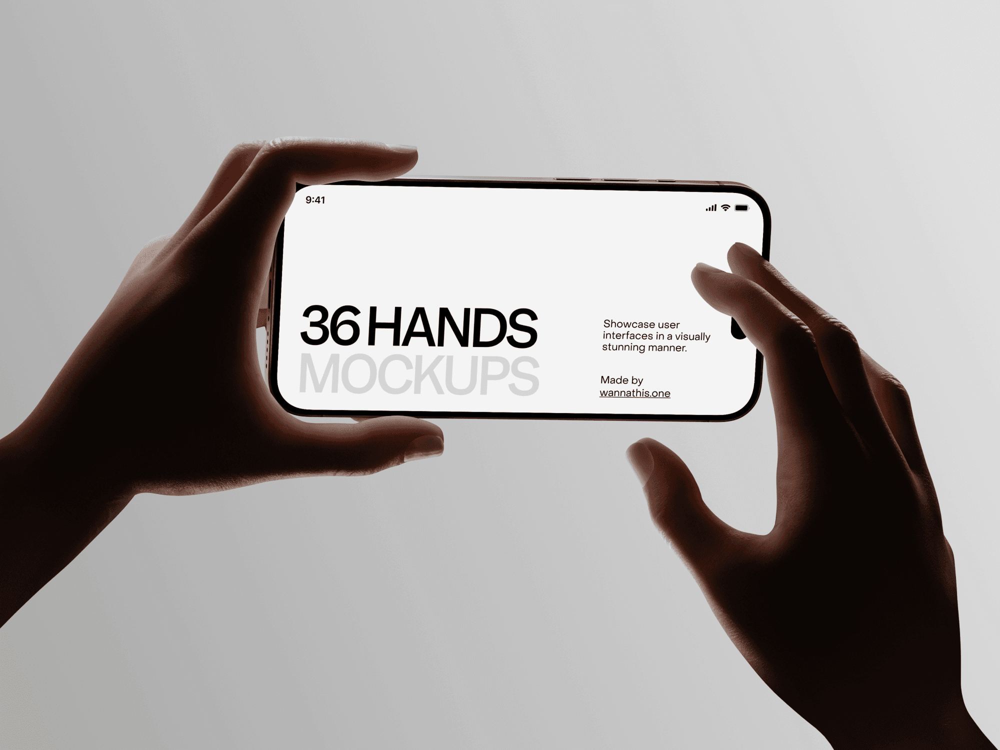 Two hands holding an iPhone in horizontal orientation in a balanced lighting scene
