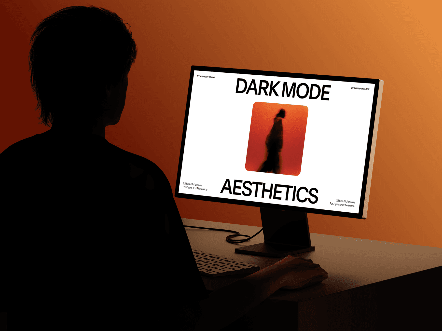 Desktop computer mockup viewed from behind a person in front of the screen