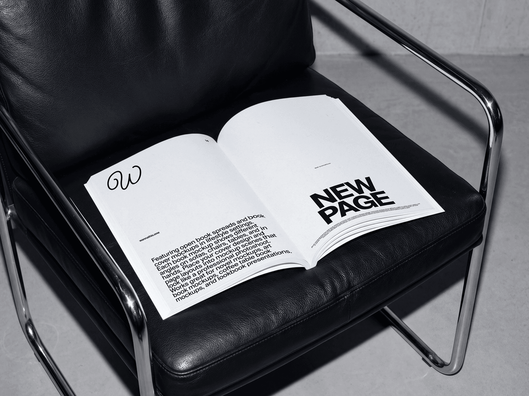 Open softcover book placed on a chair seat in a modern interior