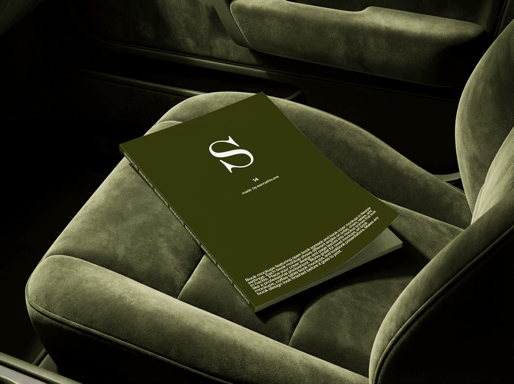 Softcover book resting on an armchair seat in a cozy scene