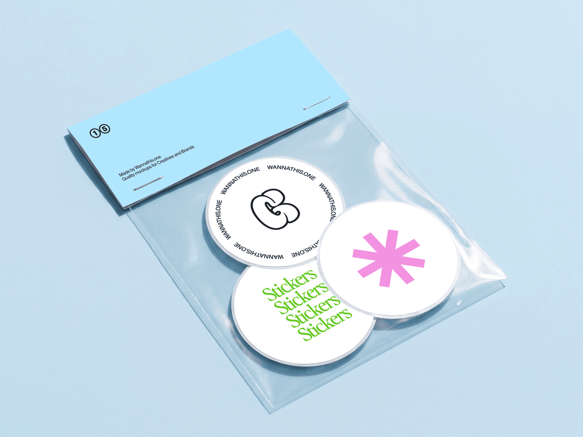 Round sticker mockups presented inside a clear plastic packaging pouch in a refined product studio scene