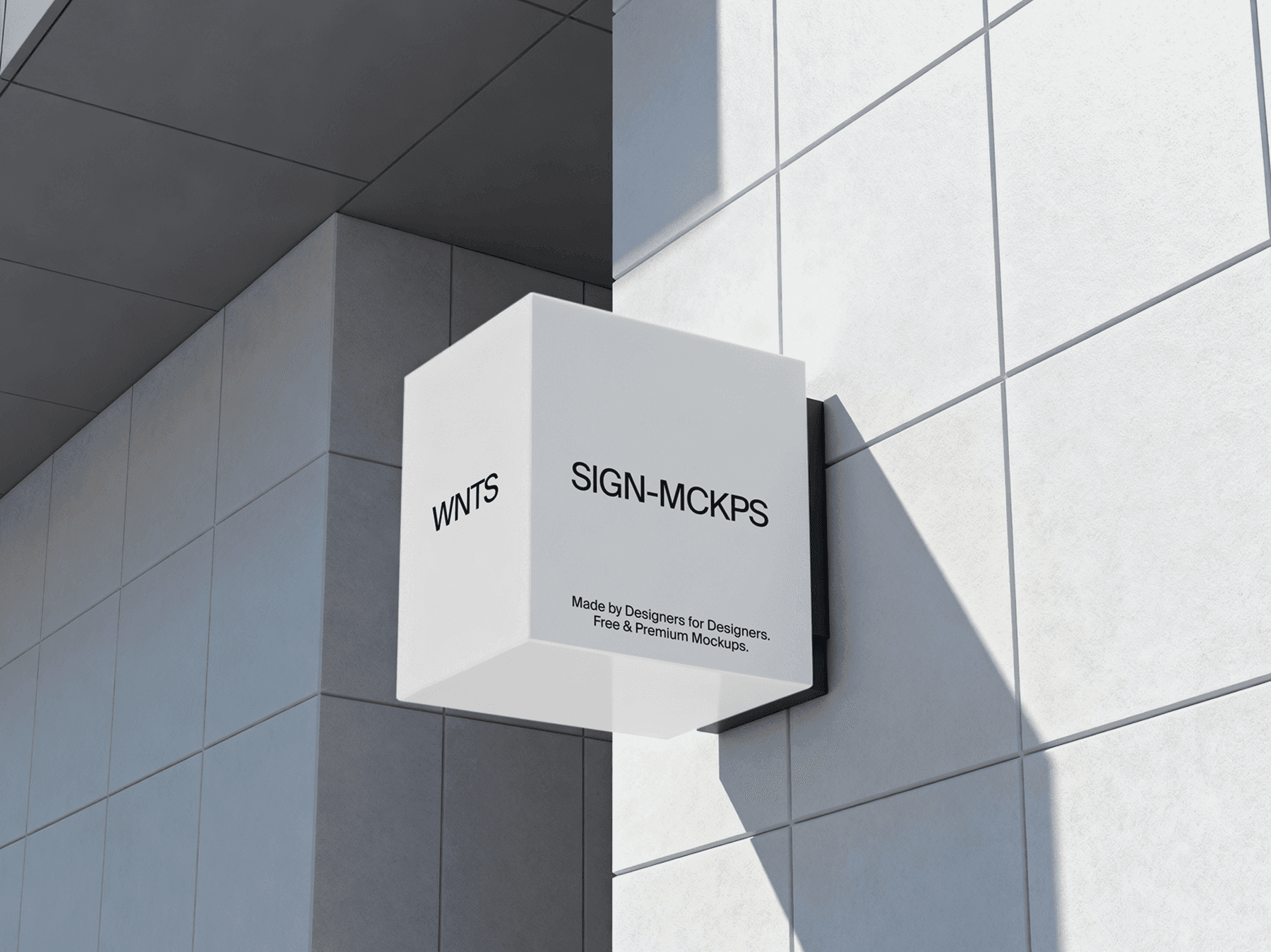 Cube-shaped wall sign mockup installed on the corner of a modern building