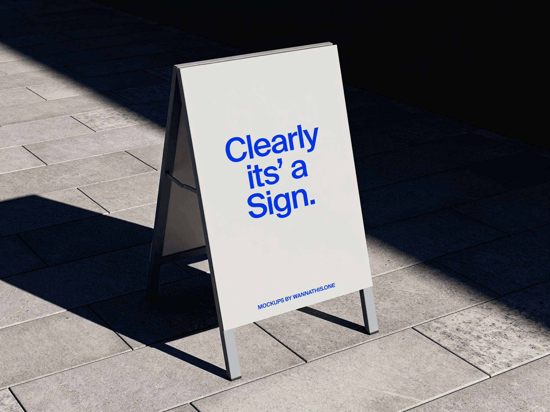 A-frame street sign mockup standing on outdoor pavement