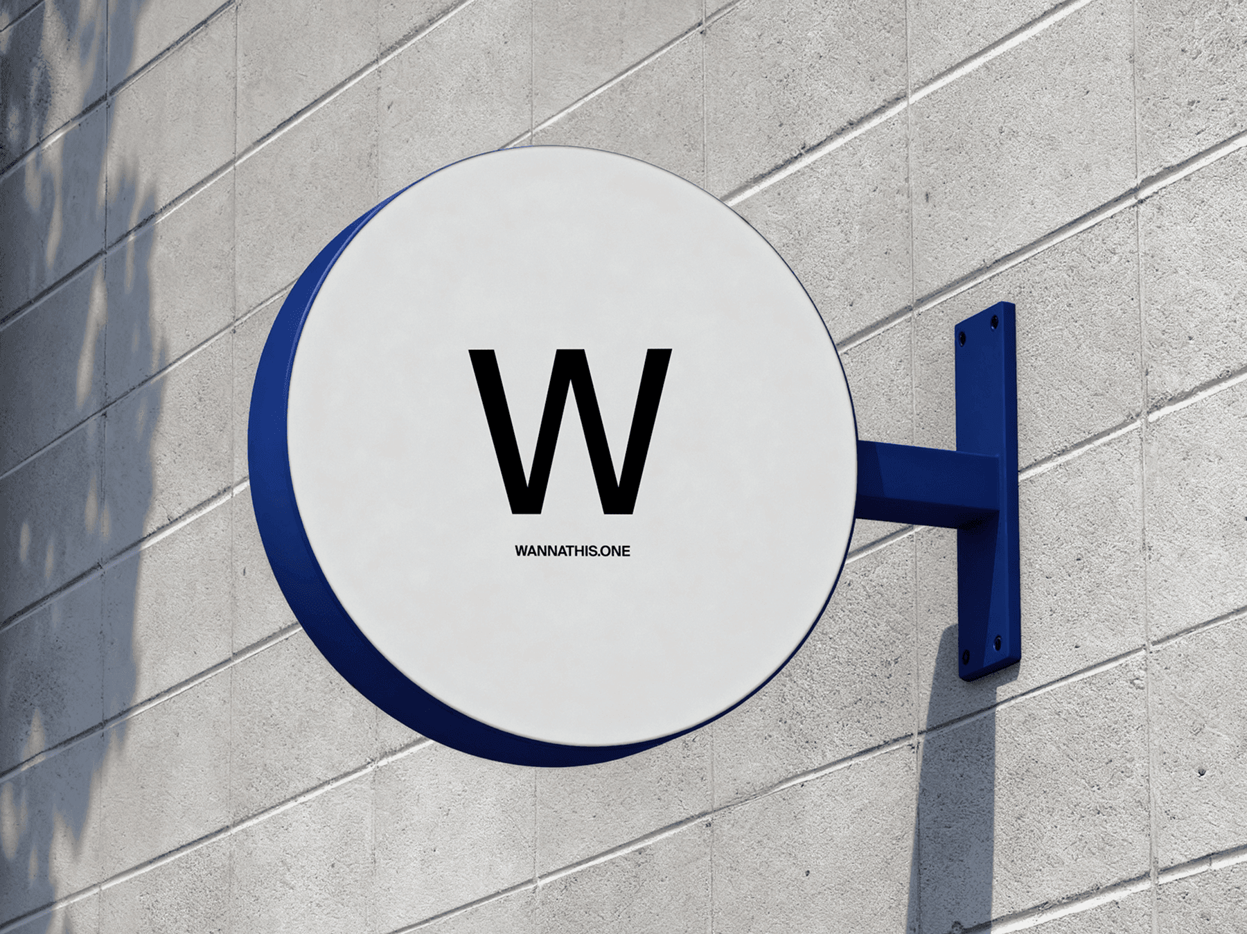 Round exterior wall sign mockup attached to a building facade
