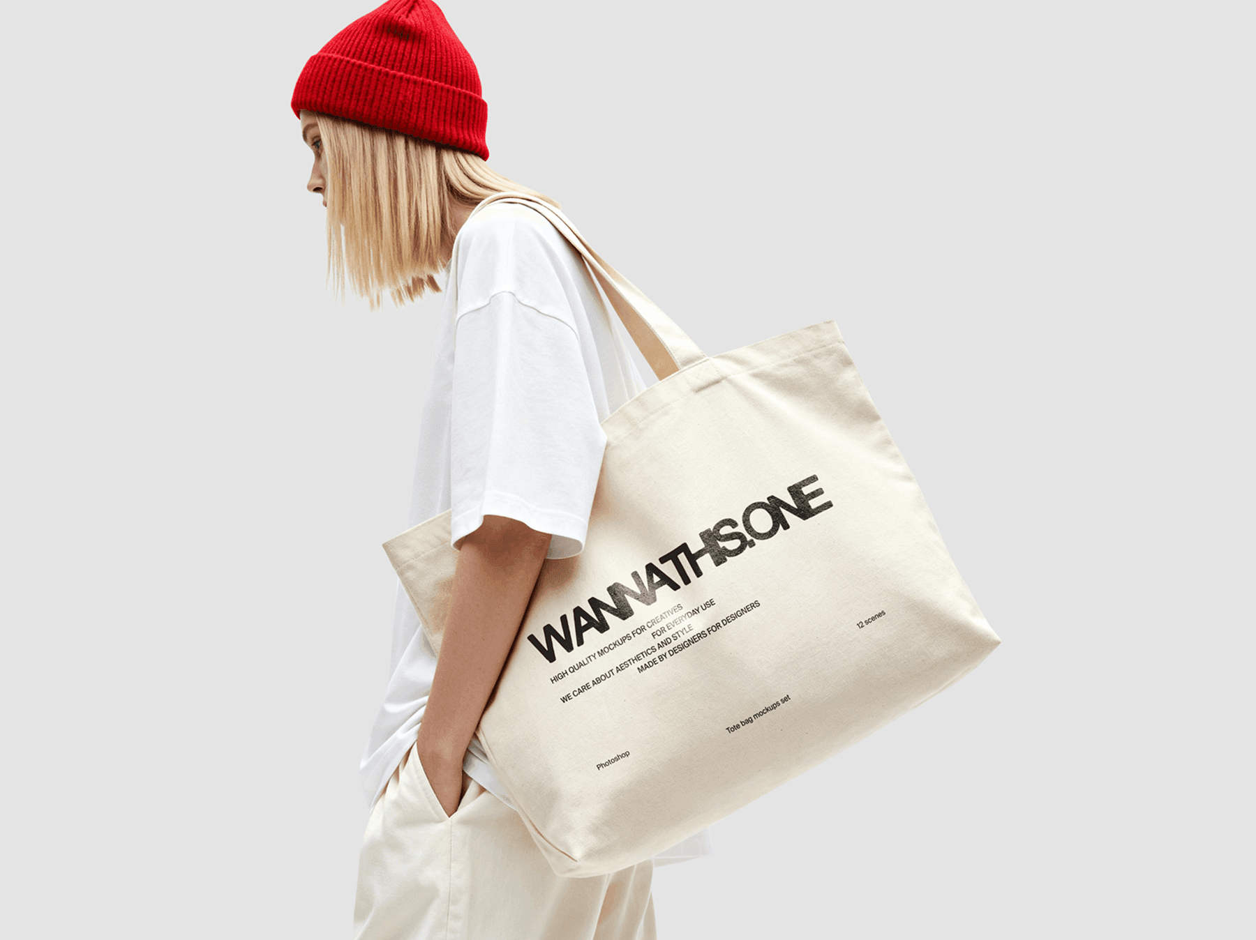 Tote bag mockup carried by a model in a casual side pose