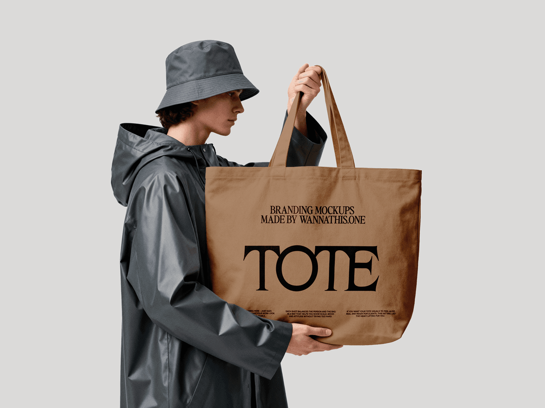 Tote bag mockup carried by a model wearing an outdoor jacket