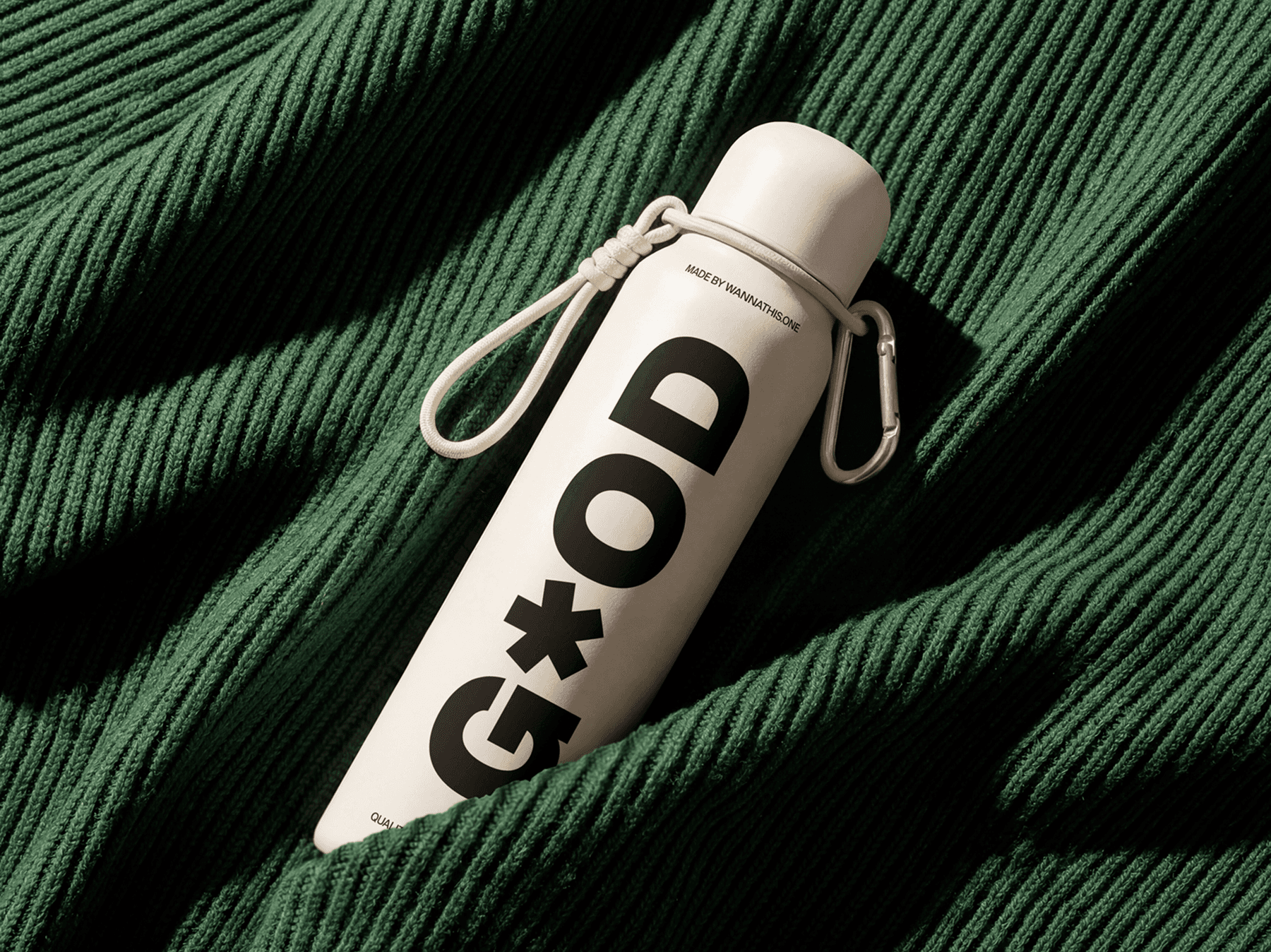 Travel bottle mockup resting on a refined textured fabric surface with soft natural shadows in studio scene