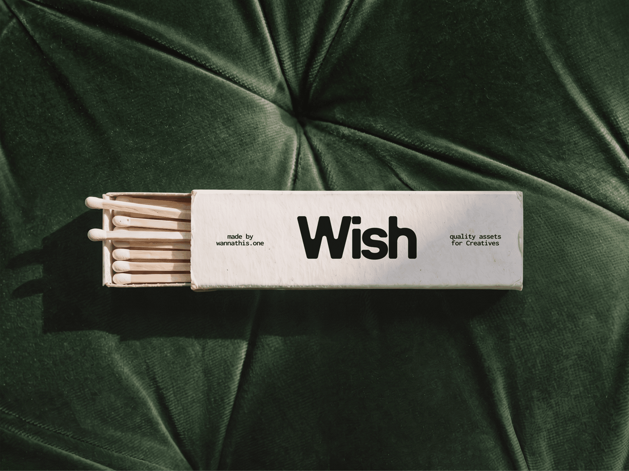 Partly open vintage matchbox resting on the padded seat of a soft chair