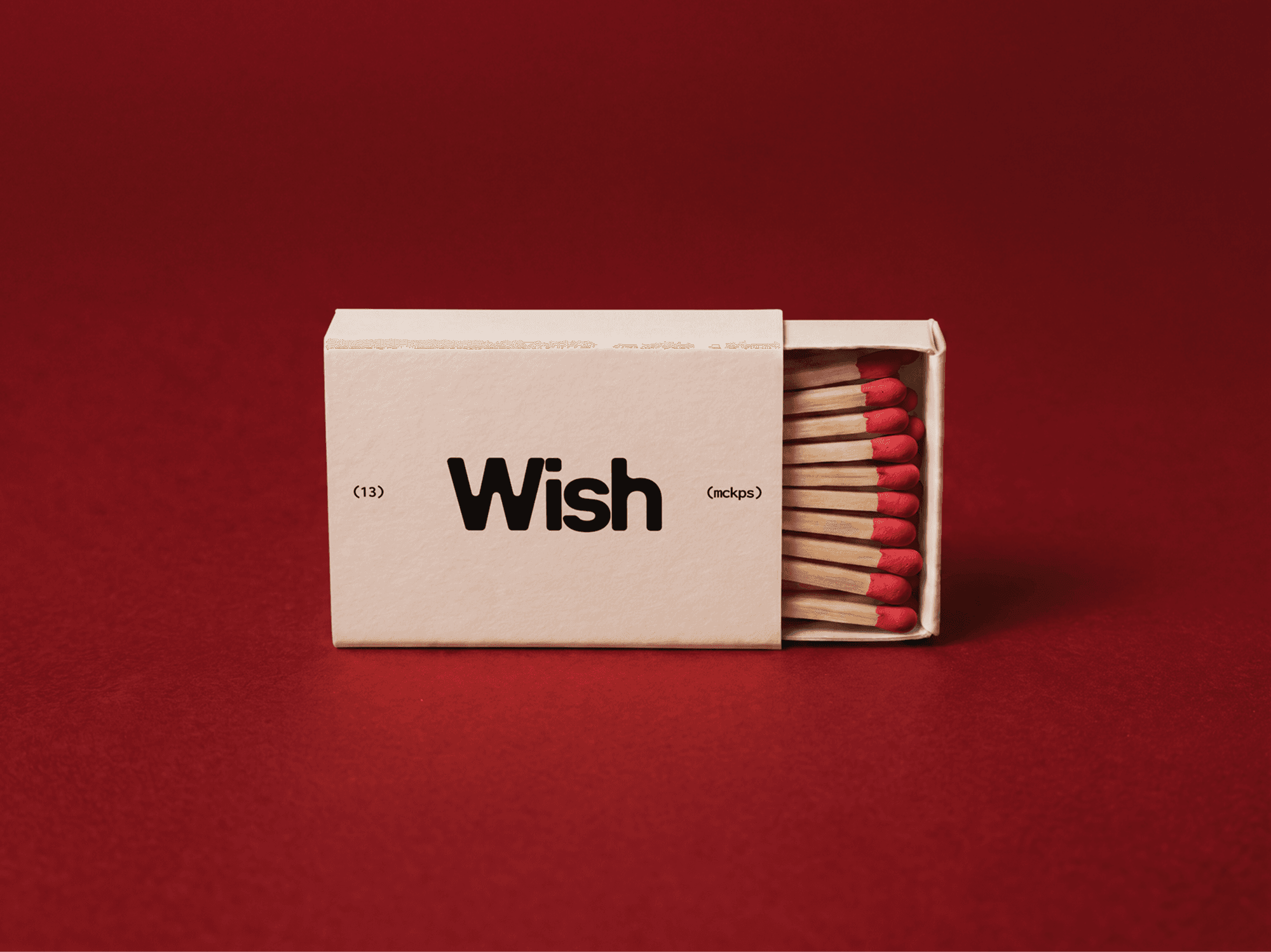 Vintage matchbox pushed partly open with a neat row of match heads showing